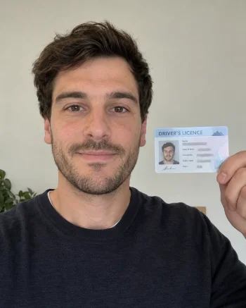 Example of a person holding their driver's licence
